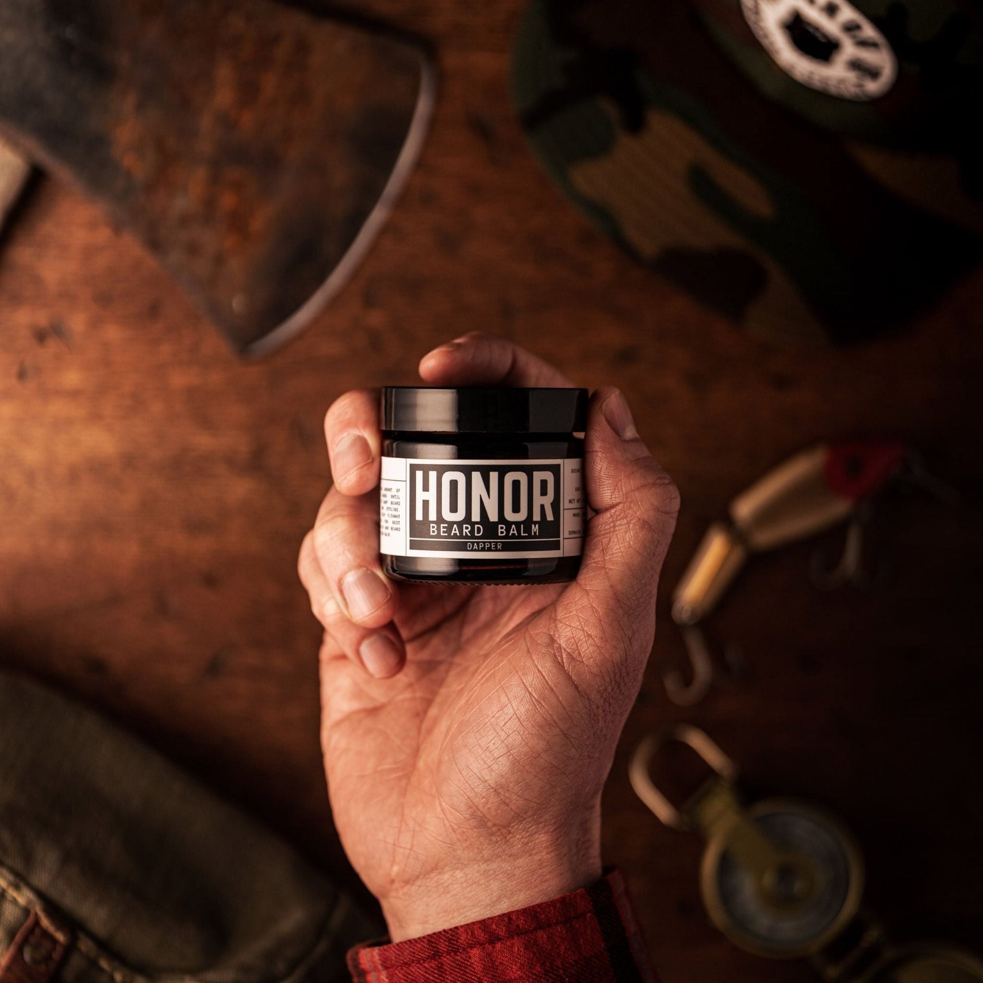 dapper beard balm in a man's hand