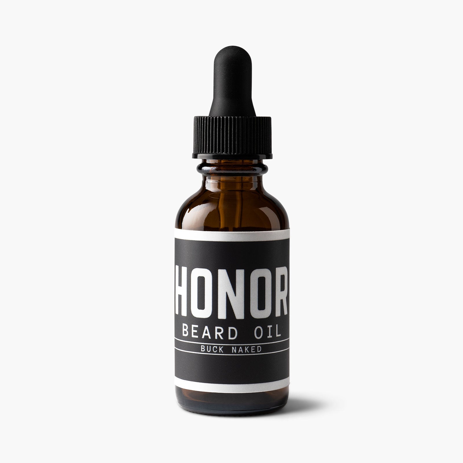 Honor's Repel blend beard oil sitting with a white backdrop