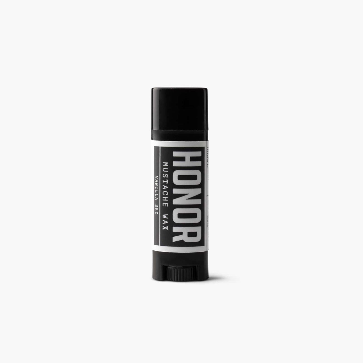 vanilla sky mustache wax on white background